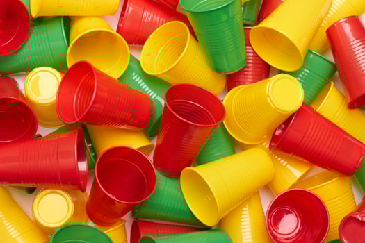 Plastic colored cup a close-up photo