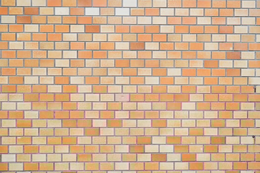 orange brick wall photo