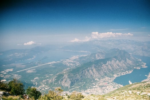 Panoramic view of Kotor Gorge in Montenegro. Grainy film in the style of old photos