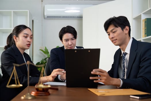 Legal Team Collaboration in Modern Office Setting photo
