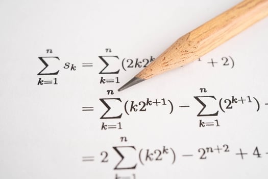 Pencil on mathematic formula exercise test paper in ed photo