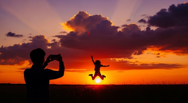 Silhouette of Person Jumping at Sunset, Photographer Capturing Moment. photo