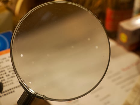 old magnifying glass detail close up photo