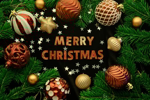 Dark Christmas background with the words MERRY CHRISTMAS. photo