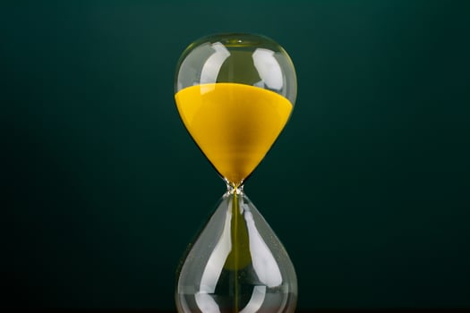 Hourglass is a process of counting down time. Limited time for work and life photo