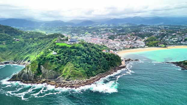 A stunning aerial view showcasing a lush coastal landscape complemented by an urban touch photo