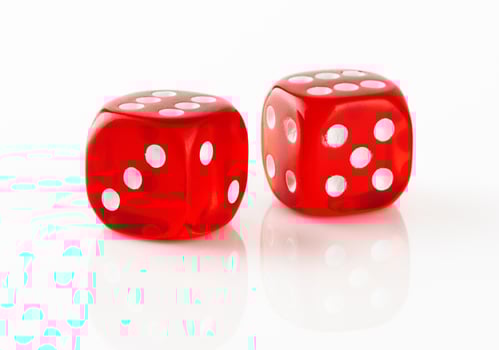 Red and white dices on white photo