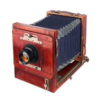 Old camera vintage on a white photo
