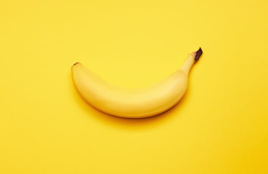 Ripe Banana on yellow photo