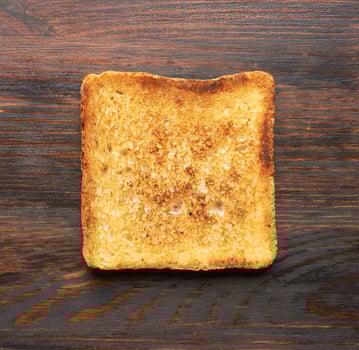 Toasts on a wooden background photo