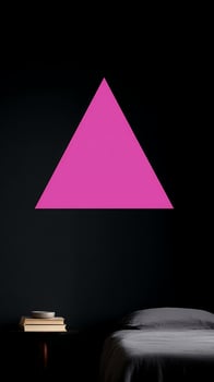 Minimalist Pink Triangle Above Cozy Bed with Books. photo