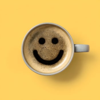 A Cheerful Coffee Cup Makes Your Day Brighter and Happier. photo