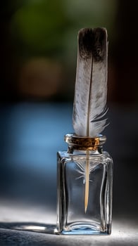 A Single Feather in a Clear Glass Bottle, Evoking History and Nature. photo