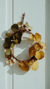 Rustic Autumn Leaf Wreath Adorns Weathered White Wood Door. photo