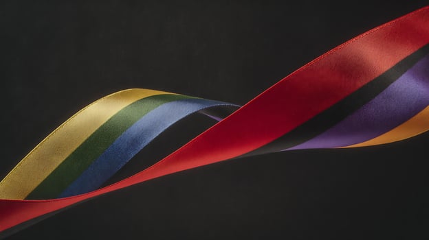 Colorful Ribbons Gracefully Flowing Against a Dark, Textured Background. photo