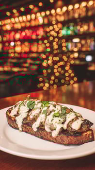 Savory Mushroom Bruschetta on Rustic Bread with Creamy Sauce and Garnish. photo