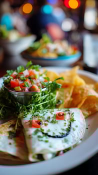 Festive Quesadilla With Salsa and Tortilla Chips Smiling Face on Plate. photo