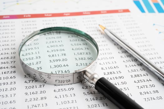 Magnifying glass graphs photo