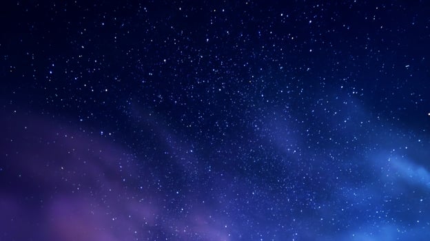 Starry Night Sky with Vibrant Colors and Twinkling Stars Illuminating the Dark Vastness of the Universe photo
