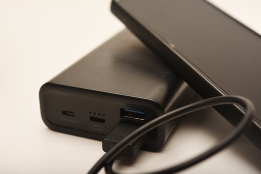 Powering up a smartphone with a power bank photo