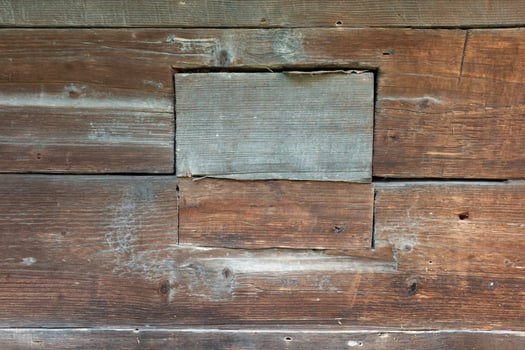 Detailed close up of aged wooden planks with a textured surface photo