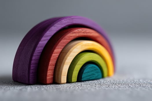 Stacking rainbow toy created with softbox lighting photo