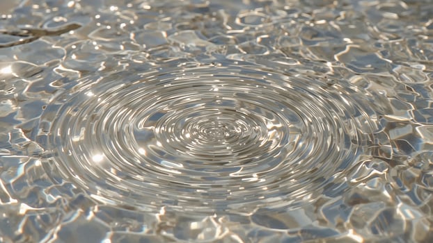 Close-up of water with vibrant splash circles in the background photo