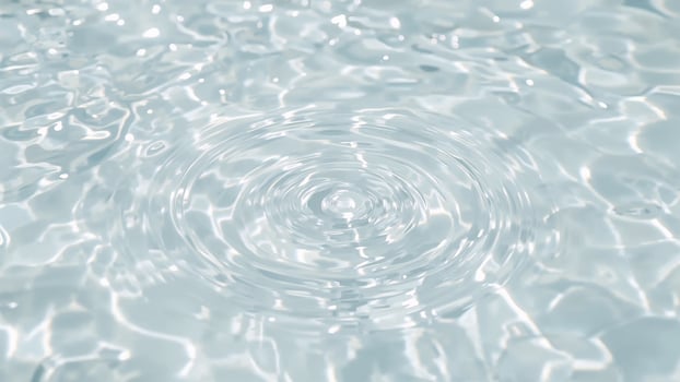 Close-up of water with splash circles as the background photo