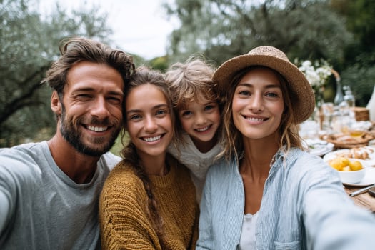 Cheerful happy family tare aking selfie on picnic on a family vacation day photo