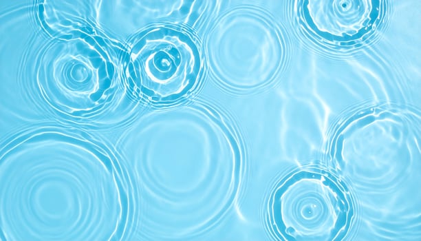 Background of gently rippling, turquoise blue water photo