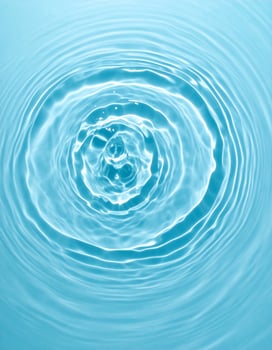 Background of tranquil, rippling light blue water photo