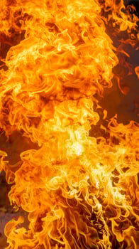 Up-close view of blazing flames against the background photo