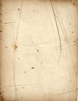 Vintage worn paper texture with an aged, distressed grunge pattern background photo