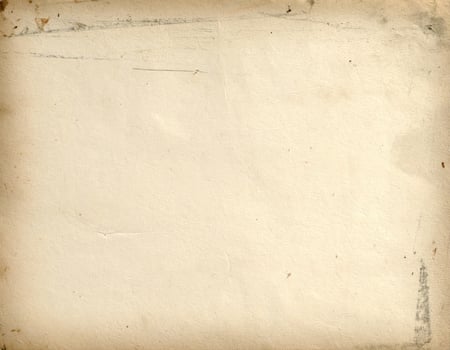 Vintage-style aged paper texture with a distressed, grungy background pattern photo