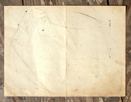 Vintage aged paper with a textured, grungy background pattern photo