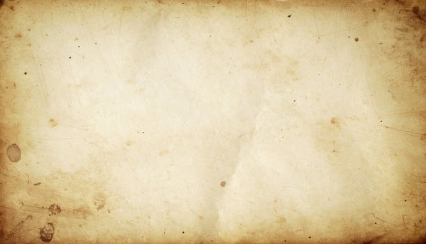 Vintage distressed paper with an aged, antique texture as background photo
