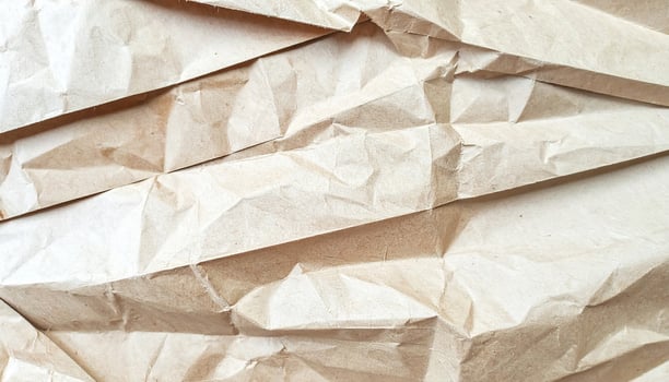 Close-up of a textured paper surface background photo
