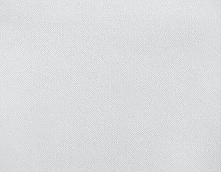 Close-up of a simple cotton fabric texture with a woven pattern background photo