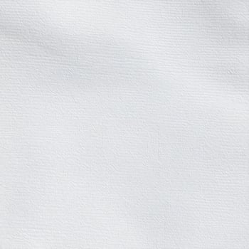 Close-up of a simple cotton fabric pattern with a textured background photo