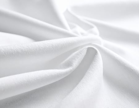 Close-up of plain cotton fabric texture with a simple woven pattern background photo