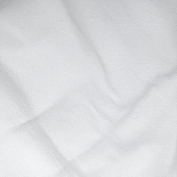 Close-up of simple cotton fabric texture and pattern as a background photo