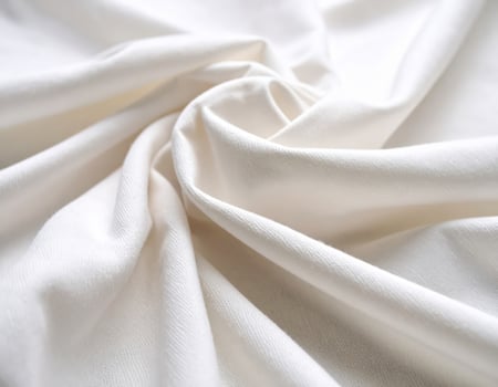 Close-up of a simple cotton fabric texture with a woven pattern as a background photo