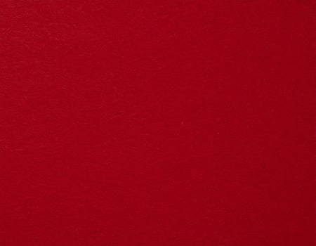 Close-up of deep crimson paper texture, ideal as a background for presentations featuring red patterns photo