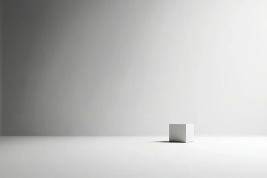 White cube in empty room with light photo