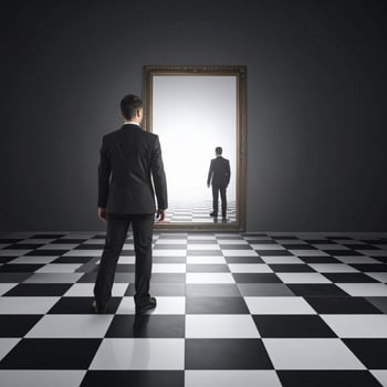 Corporate man gazing into a mirror with an uncanny reflection on a patterned floor, eerie and surreal scene photo