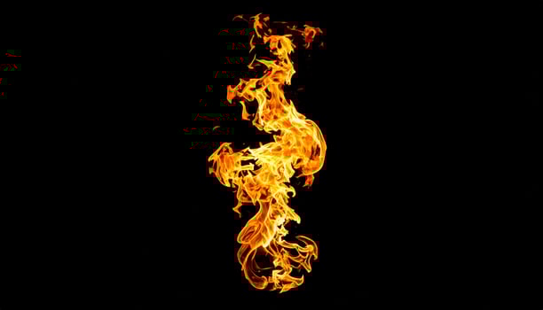 Tongues of flame against a dark backdrop photo