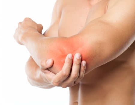 Illustration showing a glowing spot on a semi-transparent arm, indicating elbow pain spreading to nearby regions against a white backdrop. photo