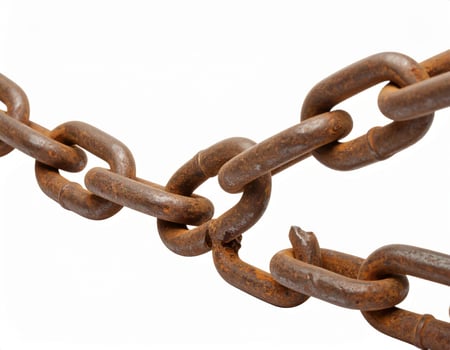 Fragmented chain against a white backdrop, symbolizing liberation or lost ties photo