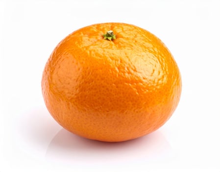 Orange tangerine against a plain white backdrop photo