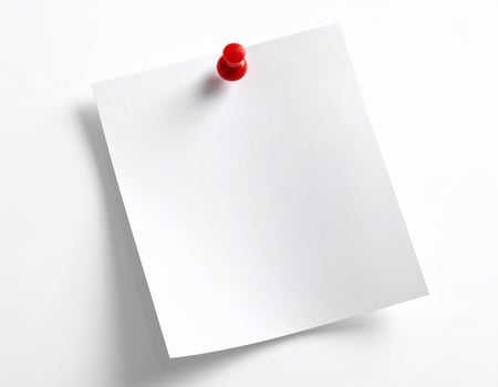 A plain white sheet of paper pinned against a white backdrop photo